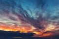 Dramatic colorful red orange to dark blue sunset or sunrise sky landscape clouds. Natural beautiful cloudscape dawn Royalty Free Stock Photo