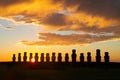 Dramatic colorful sunrise over Moai stone sculptures at Ahu Tongariki, Easter island, Chile.