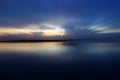 Blue beach background. With smooth blue sky clouds over sea horizon. Royalty Free Stock Photo