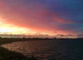 A Dramatic and colorful Sunset and the Shore