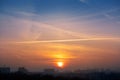 Dramatic colorful sunset or sunrise sky landscape with line row of city buildings silhouettes . Natural beautiful cityscape dawn Royalty Free Stock Photo