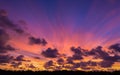 Dramatic colorful twilight sky with floating clouds