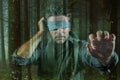 Young confused and scared man blindfolded with necktie playing internet trend dangerous viral challenge with eyes blind lost in Royalty Free Stock Photo