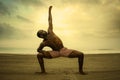 Dramatic contemporary dance choreographer doing ballet beach workout, young attractive and athletic afro black American man