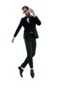 Dramatic cool businessman jumping in the air Royalty Free Stock Photo