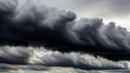 Dramatic dark storm clouds gathering in a grey sky Royalty Free Stock Photo