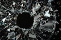 A dramatic depiction of a broken compact disc, featuring shattered pieces and reflective surfaces on a dark background Royalty Free Stock Photo
