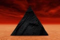 Dramatic desert pyramid silhouette against fiery sky