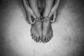 Dramatic detail of the chained feets Royalty Free Stock Photo