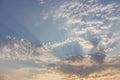 Dramatic evening sky with rays of light. Aerial view of blue sky with clouds. Heaven concept. Sunshine in the sky. Royalty Free Stock Photo