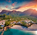 Dramatic evening view of Paralia resort. Colorful outdoor scene of Peloponnese peninsula, Greece Royalty Free Stock Photo