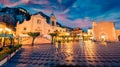 Dramatic evening view of Taormina town, IX Aprile plaza with San Giuseppe church and old fortress on background, Sicily, Italy, Eu Royalty Free Stock Photo