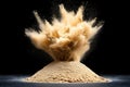 Dramatic Explosion of Brown Powder Creating an Eye-Catching Abstract Design on Dark Background Royalty Free Stock Photo