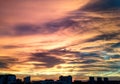 Dramatic fiery sunset over the city at dusk, abstract background