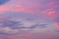 Dramatic fiery sunset sky in a mixture of violet, pink, orange and black colors