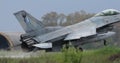 Dramatic Fighter Jet Rain Landing and Water Splashes. Engine Close-up