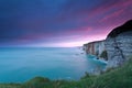 Dramatic fire sunrise over cliffs in ocean Royalty Free Stock Photo