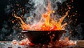 Dramatic flames erupting from boiling cauldron with steam and splashing water Royalty Free Stock Photo
