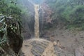 The dramatic flooding and landslides of a waterfall in Pekalongan. Royalty Free Stock Photo