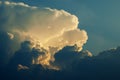 Dramatic formation of cumulonimbus clouds rising in blue sky