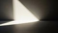 Dramatic geometric light beam casting sharp shadows on a minimalist interior wall Royalty Free Stock Photo