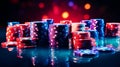 Dramatic glowing poker chips stack on minimalistic studio background with free copy space Royalty Free Stock Photo