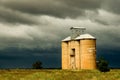 Dramatic grain silos in an impending storm, New South Wales Royalty Free Stock Photo