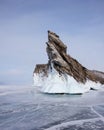 Dramatic graphical gray rock sharp texture white coastal splash ice Ogoy island Baikal lake Russia. Snow field landscape. Winter Royalty Free Stock Photo