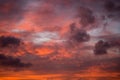 dramatic high contrast clouds in sunset over seaside beach