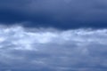 Dramatic high deep blue sky with fluffy clouds Royalty Free Stock Photo