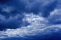 Dramatic high deep blue sky with fluffy clouds Royalty Free Stock Photo