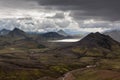 Dramatic Iceland scenery with green mountains.