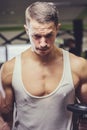 Young man in the gym powerlifting Royalty Free Stock Photo