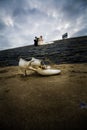 Beachfront Nuptials: Bridal Shoes and Seaside Vows Royalty Free Stock Photo