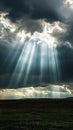Sun Rays Through Clouds Over Field Royalty Free Stock Photo