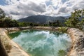 Dramatic image of water reservoir on the mountain countryside for fields and farms in the caribbean, dominican republic.