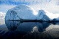 Dramatic landscape in antarctica, with icebergs and mountains Royalty Free Stock Photo