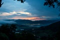 Dramatic landscape caribbean mountain image with storm clouds at dawn sunset. Royalty Free Stock Photo