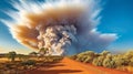 Dramatic landscape with heavy fire and puffs of smoke in Western Australia, bushfire. Royalty Free Stock Photo