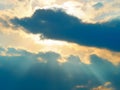 Dramatic light rays coming out of clouds background Royalty Free Stock Photo