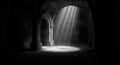 Dramatic Light Rays in Dark Stone Archway Interior Royalty Free Stock Photo