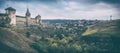 Storm clouds gather around Medieval gothic castle on the hill. Panoramic view Royalty Free Stock Photo