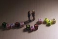 Dramatic Lighting Simple Photo, Mini Figure Businessman Toy, Handshaking with Happy New Year Word Plastic Alpabhet Cube Bead