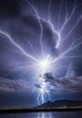 A dramatic lightning strike branches across a night sky, Royalty Free Stock Photo