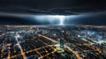 A dramatic lightning strike illuminates a city skyline during a thunderstorm at night Royalty Free Stock Photo