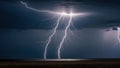 Dramatic lightning strike illuminates a wide open field with dark storm clouds in the background Royalty Free Stock Photo