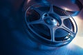 Dramatic lit image of a movie reel