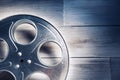 Dramatic lit image of a movie reel