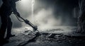 Hard Labor: Construction Worker Operating Jackhammer in Dusty Environment Royalty Free Stock Photo