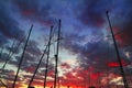 Dramatic marina sailboat mast sunset sky backlight Royalty Free Stock Photo